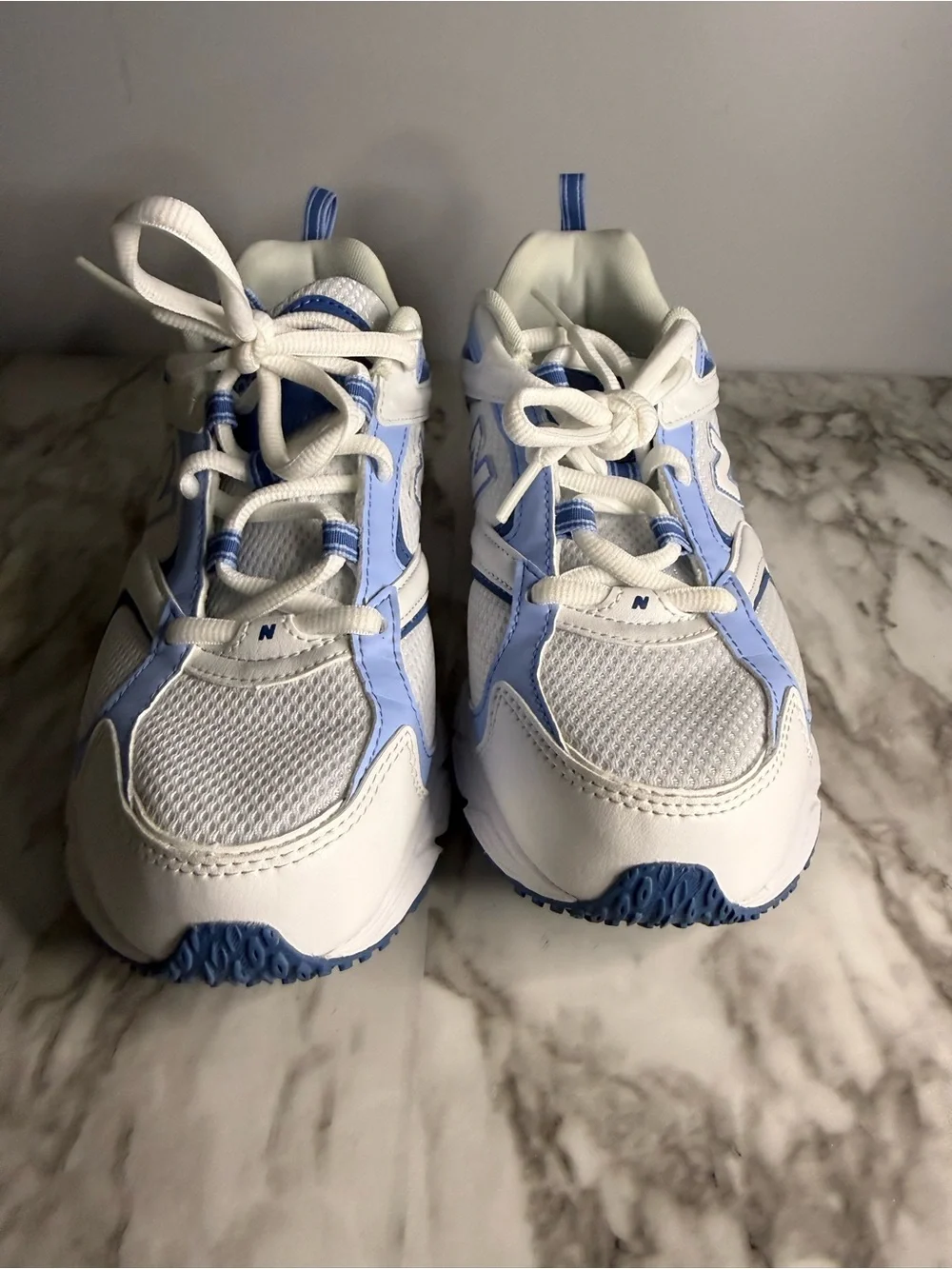 New Balance men’s White & Light Blue Athletic Sneakers